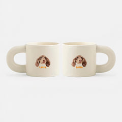 Two custom pet portrait mugs featuring a spaniel dog with the name ‘Latte’ on each mug